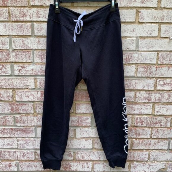 Calvin Klein Pants - Calvin Klein performance black with white logo sweatpants. Size small